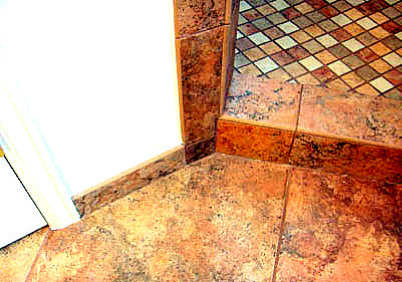 Glazed bullnose tile on opposite sides for a shower curb.